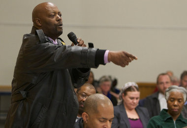 Fred Bryant, a longtime Portland resident, is among about 60 people taking part in a Tuesday town hall at the St. Johns Community Center, sponsored by the U.S. Department of Justice. He calls for accountability in the fatal police shooting of his son, Keaton Otis, during a traffic stop in May 2010. (Photo by Randy L. Rasmussen / The Oregonian)